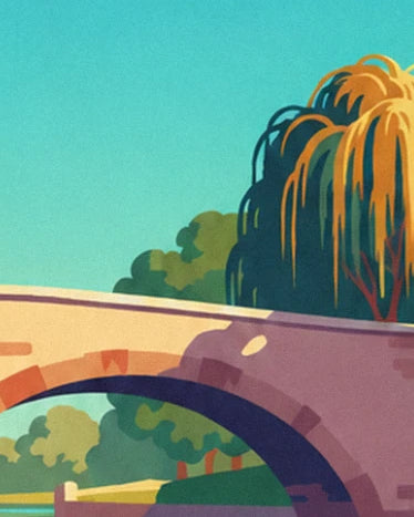 Le pont de pierre rose et son saule aux feuilles dorées, sous un ciel turquoise