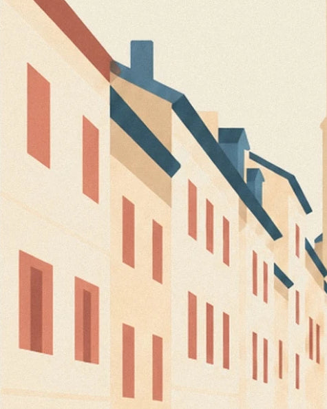 Les façades crème aux fenêtres corail, sous les toits bleus et leurs cheminées
