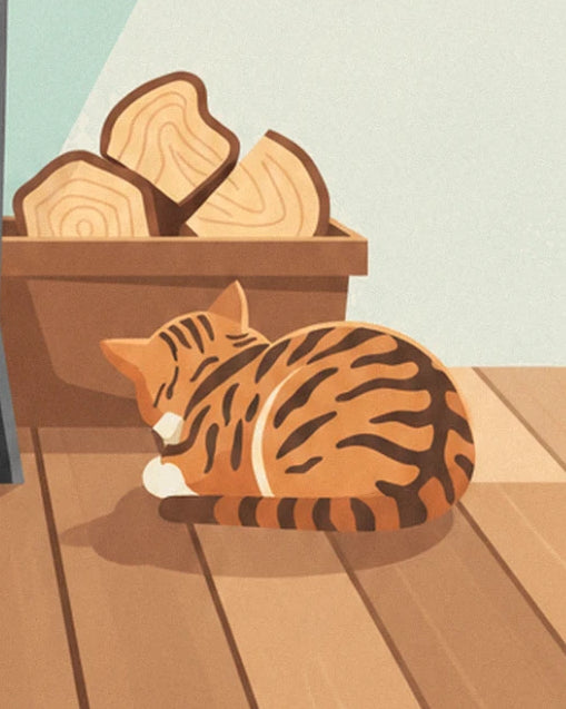 Le chat tigré orange roulé en boule sur le parquet, près du panier de bûches