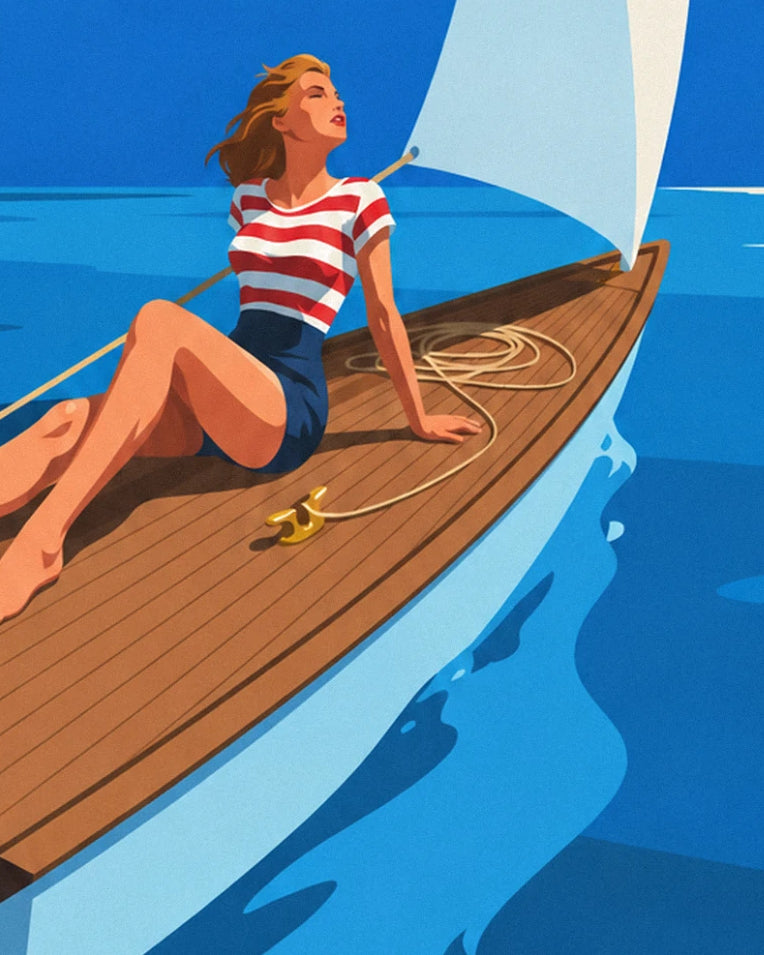 Affiche pin-up sur le pont d'un voilier en pleine mer : détail en gros plan