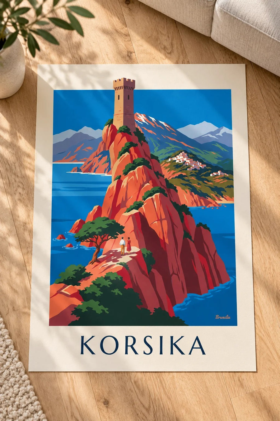Affisch med Korsikas vilda kust, röda klippor och Monte Cinto: liggande på ett bord
