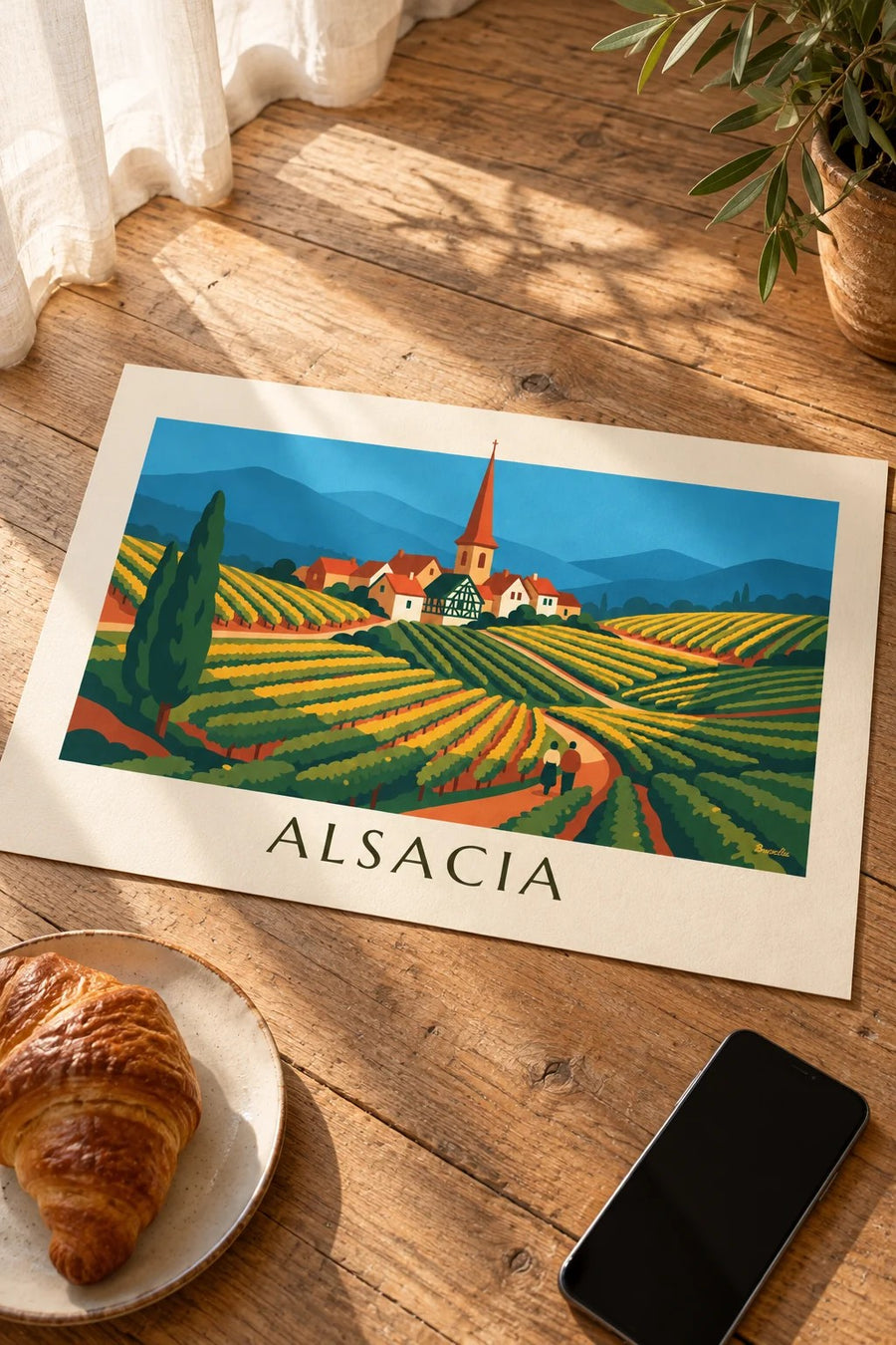 Cartaz da rota dos vinhos e das vinhas em socalcos da Alsácia: pousado numa mesa