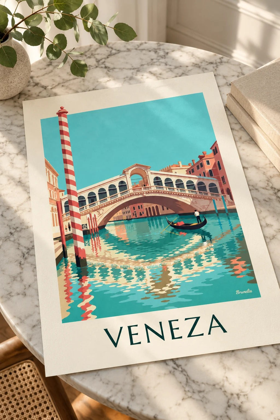 Cartaz da ponte de Rialto e de uma gôndola no Grande Canal de Veneza: pousado numa mesa