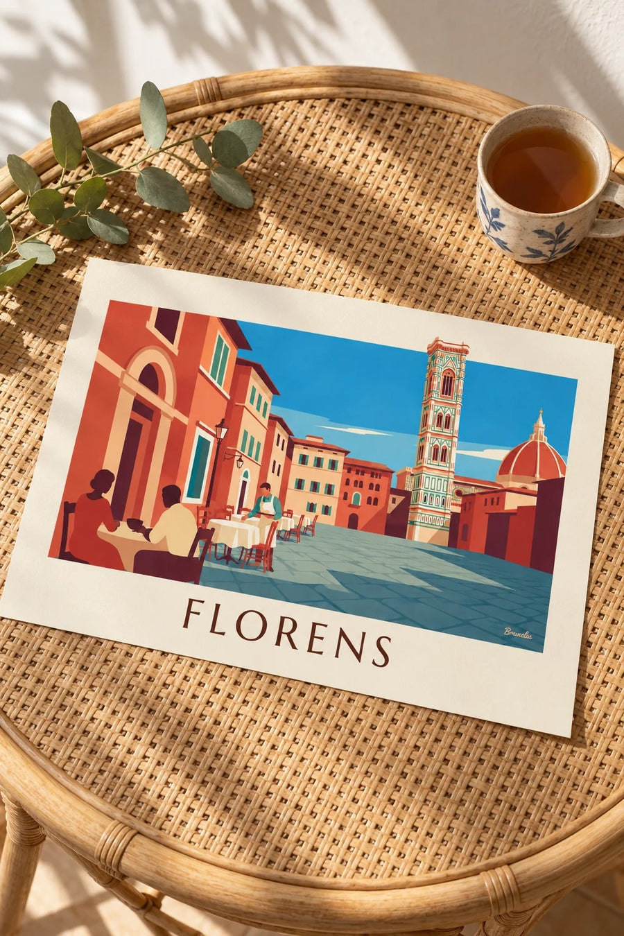 Affisch med caféterrass framför Florens domkyrka: liggande på ett bord