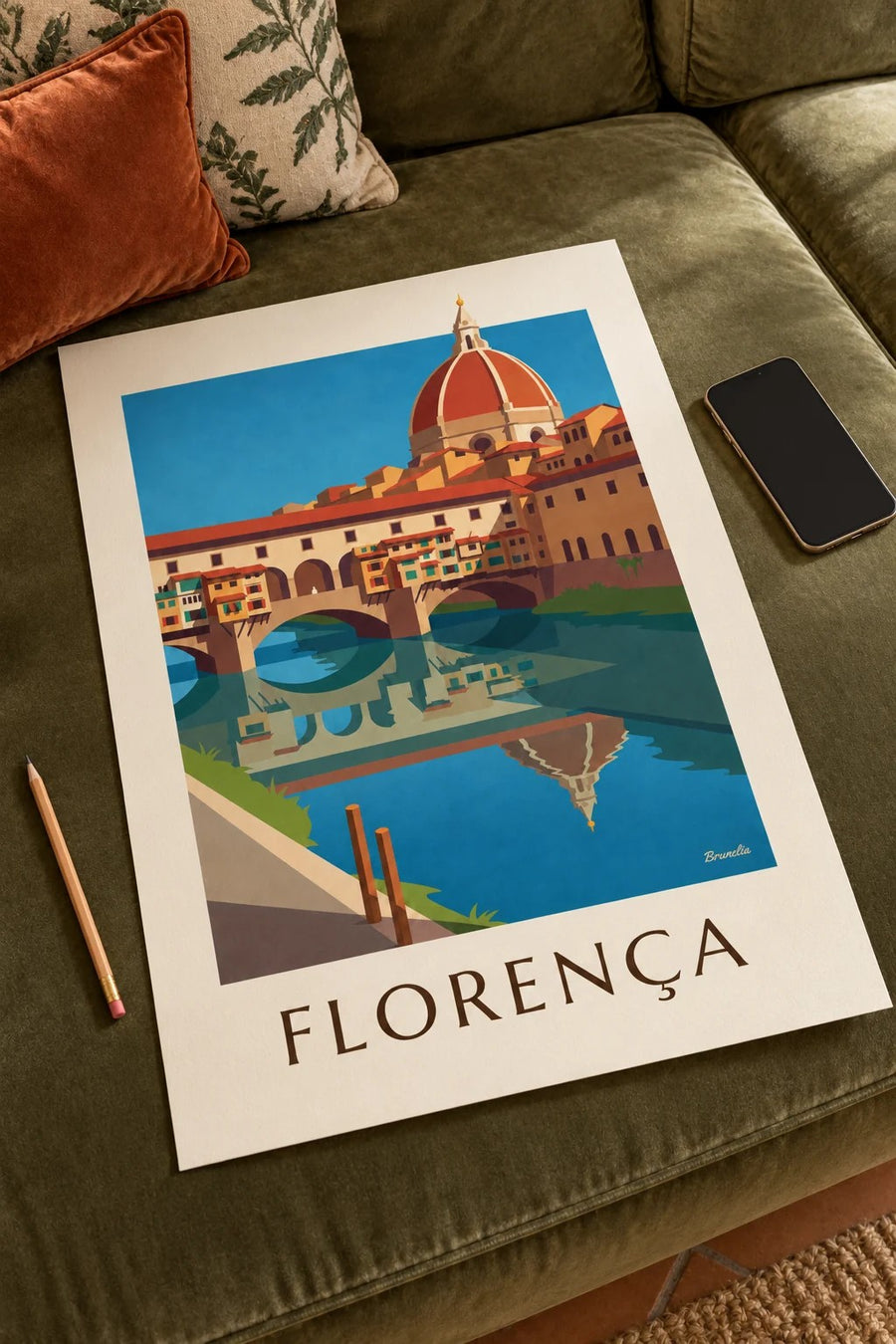 Cartaz da Ponte Vecchio e do Arno, em Florença: pousado numa mesa