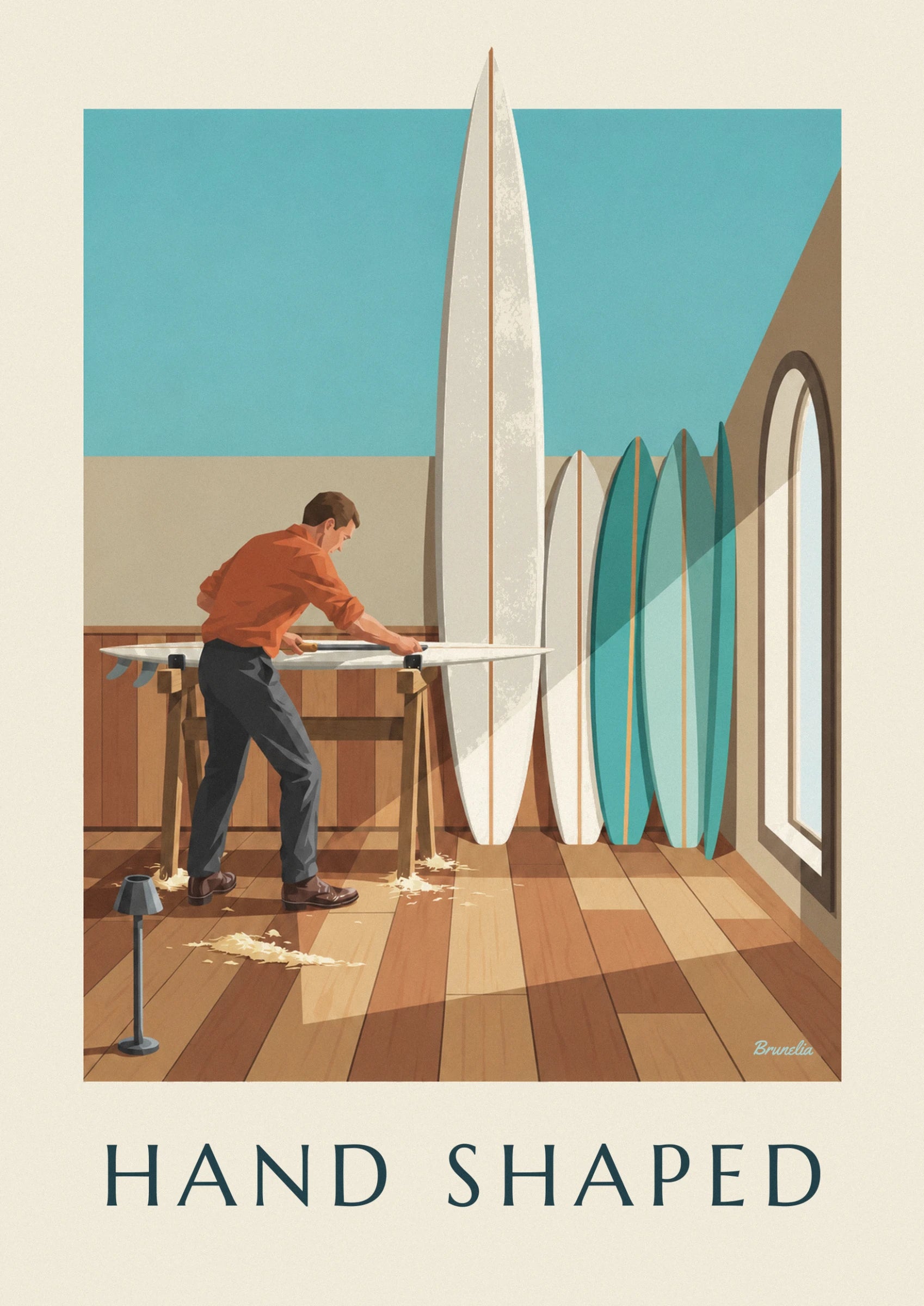 The surfboard shaper in an orange shirt planing a board on 2 trestles, with shavings on the floor